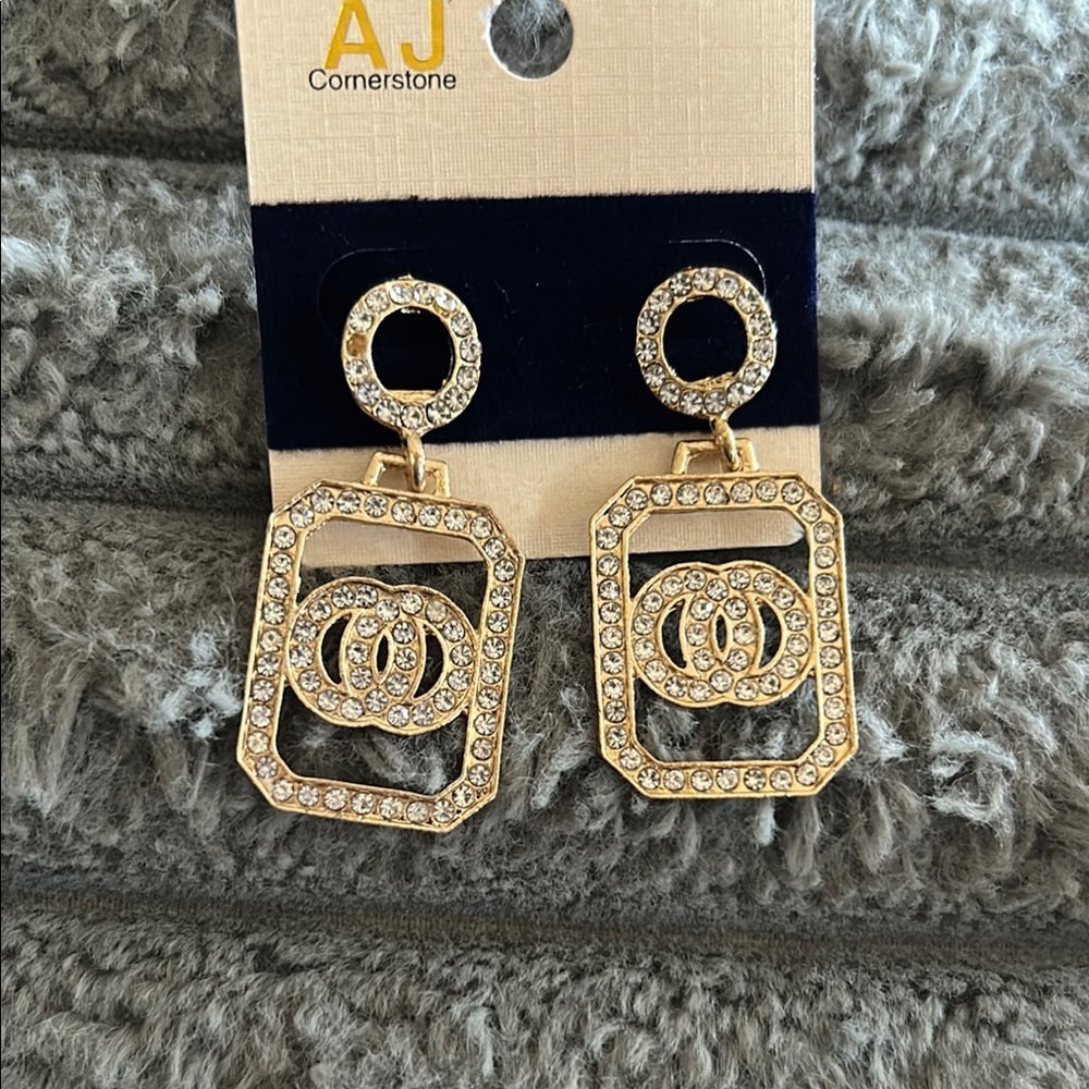 Gold fashion earrings will complement any outfit